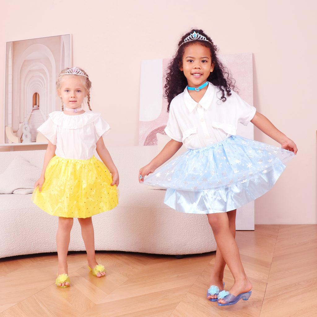 Two girls showing the princess role play dress up skirts and play shoes