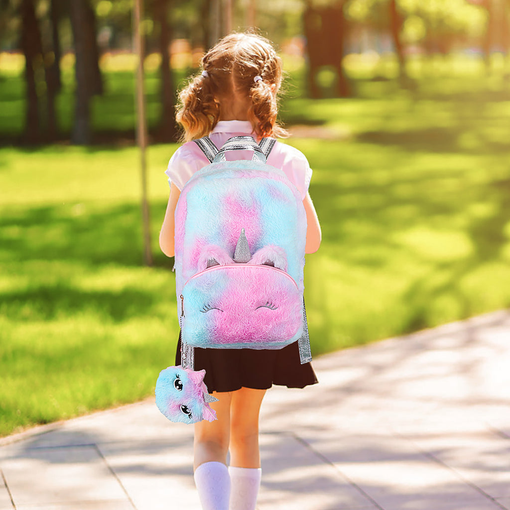 A girl wearing unicorn furry backpack