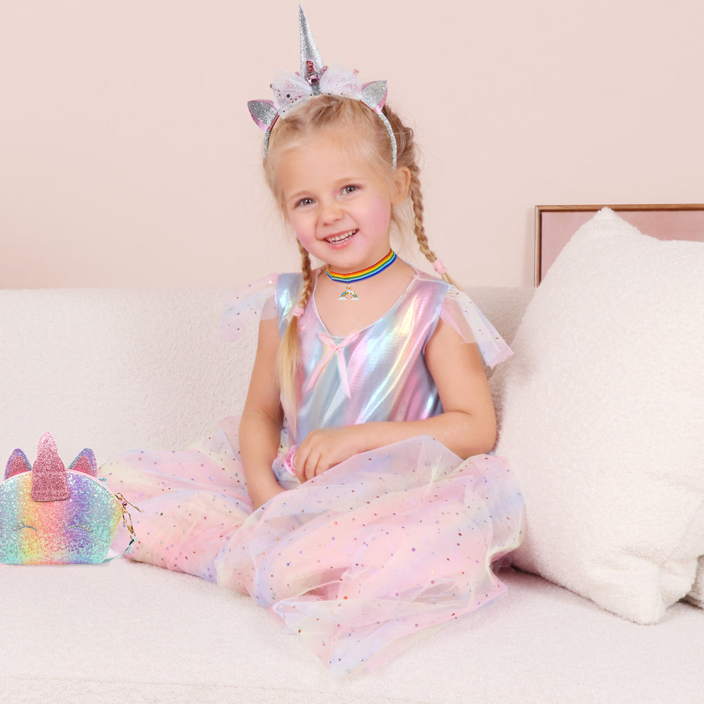 A girl wearing the unicorn princess dress