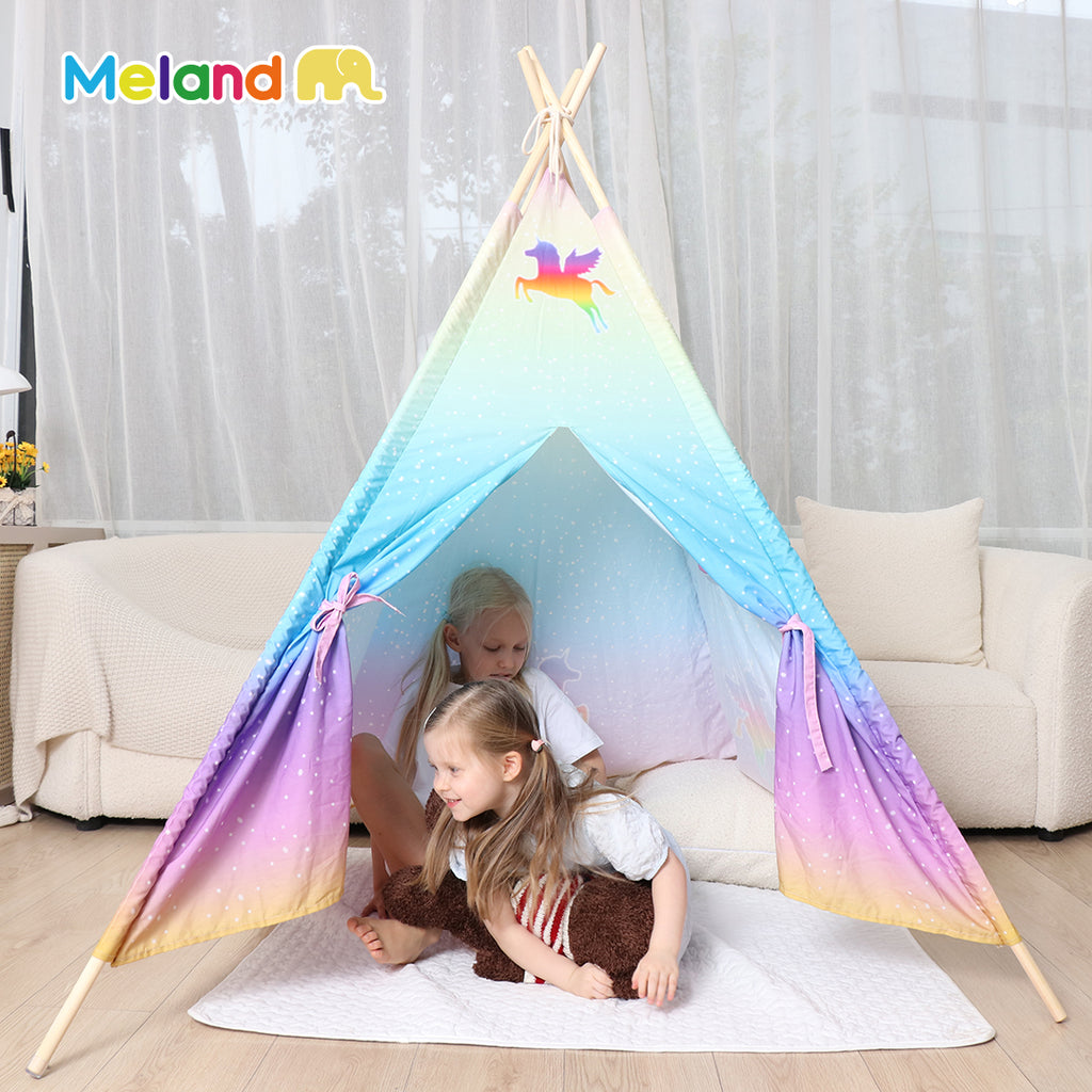 Two girls inside the unicorn teepee tent for kids